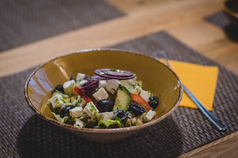 Fresh colorful salad ingredients in a bowl